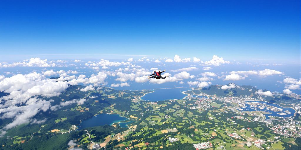 Skydiver above Bali's stunning landscape and beaches.